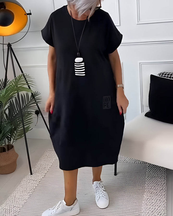 Grażyna | Sukienka midi z unikatowym detalem „HOPE”